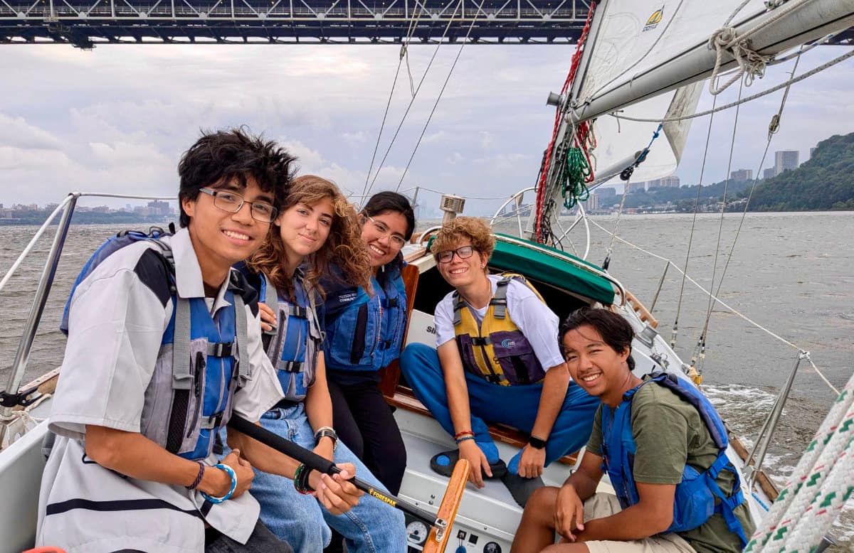 alumini-inwood High School students sailing on the Hudson River.