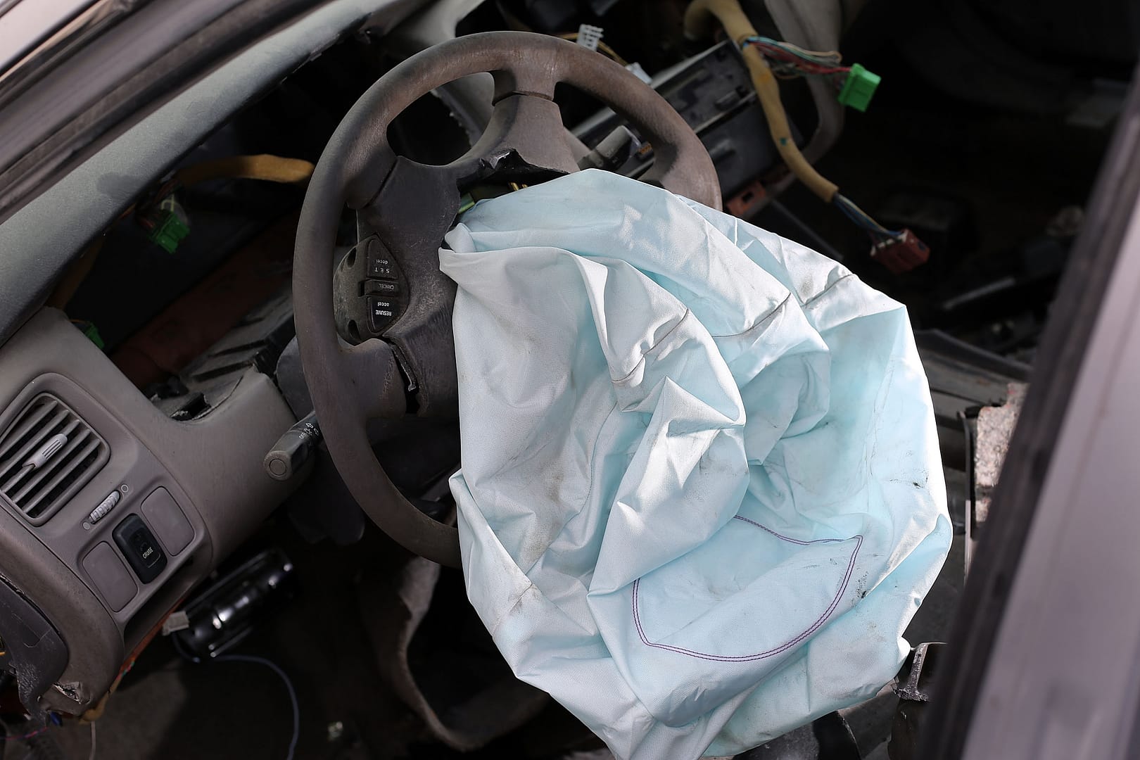 MEDLEY, FL - MAY 22:  A deployed airbag is seen in a 2001 Honda Accord at the LKQ Pick Your Part salvage yard on May 22, 2015 in Medley, Florida. The largest automotive recall in history centers around the defective Takata Corp. air bags that are found in millions of vehicles that are manufactured by BMW, Chrysler, Daimler Trucks, Ford, General Motors, Honda, Mazda, Mitsubishi, Nissan, Subaru and Toyota.  (Photo by Joe Raedle/Getty Images)
