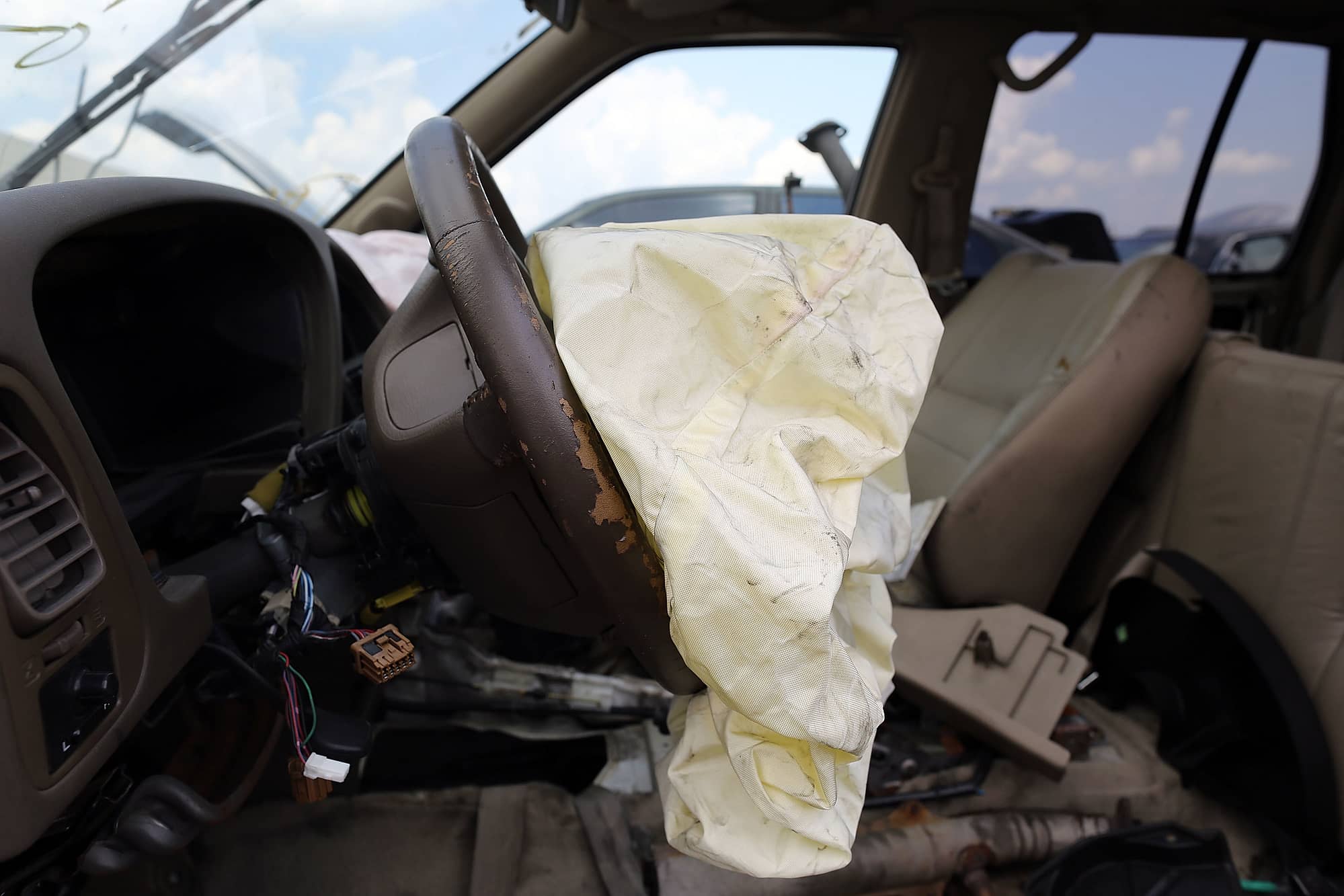 MEDLEY, FL - MAY 22:  A deployed airbag is seen in a Nissan vehicle at the LKQ Pick Your Part salvage yard on May 22, 2015 in Medley, Florida. The largest automotive recall in history centers around the defective Takata Corp. air bags that are found in millions of vehicles that are manufactured by BMW, Chrysler, Daimler Trucks, Ford, General Motors, Honda, Mazda, Mitsubishi, Nissan, Subaru and Toyota.  (Photo by Joe Raedle/Getty Images)