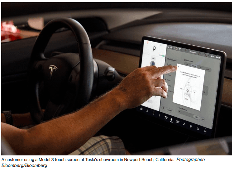 Tesla Model 3 steering wheel and screen Bloomberg 10.26.2022